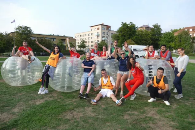 A group of students with zorb balls.